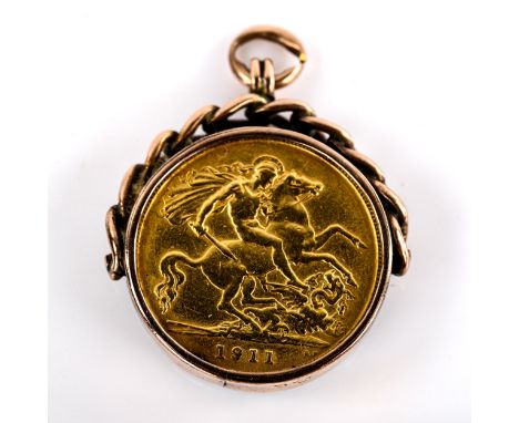 A 1911 half sovereign gold coin, in 9ct rose gold fob with bloodstone panel, fob height 26.1mm, 8.7g grossGeneral surface wea