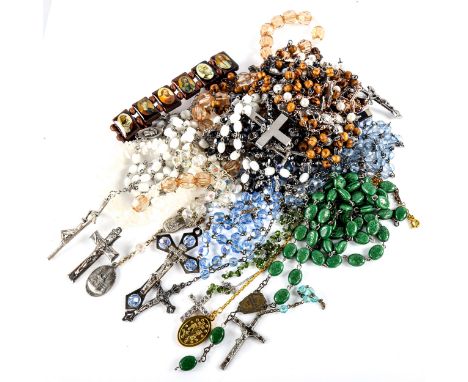 A quantity of modern rosaries, cross pendants etcLot sold as seen unless specific item(s) requested 