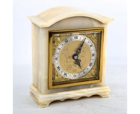 A Vintage polished onyx dome-top mantel clock, by Elliott of London, gilt dial with silvered chapter ring, Roman numeral hour