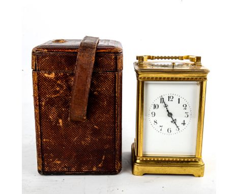 A large French brass-cased repeater carriage clock, white enamel dial with Arabic numerals, blued steel hands, bevelled glass