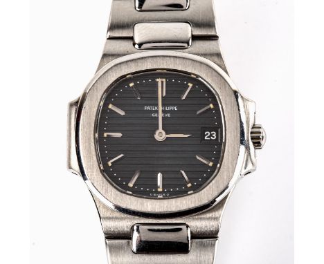 PATEK PHILIPPE - a lady's stainless steel Nautilus quartz bracelet watch, ref. 4700/1, circa 1980s, dark blue ridged dial wit