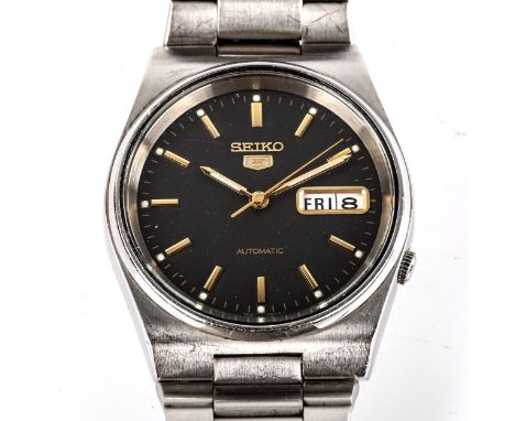 SEIKO 5 - a Vintage stainless steel automatic bracelet watch, ref. 7S26-3130, dark grey dial with gilt baton hour markers and