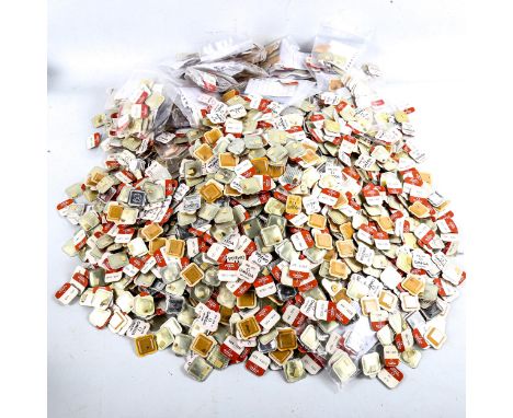 OMEGA - a large quantity of various Vintage watch parts, including balance wheels, cogs, screws, springs etc, all in original