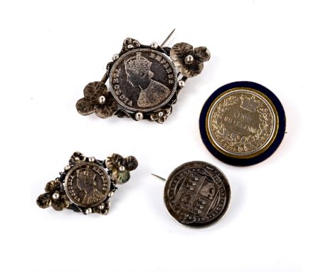 Various British coin jewellery, including 1875 shilling with blue enamel frame, 34.4g total (4)All pieces quite worn with a f