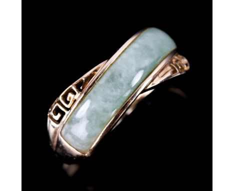 A modern 9ct gold jade dress ring, with pierced Greek key shoulders, setting height 7.8mm, size M, 2.9gNo damage or repairs, 