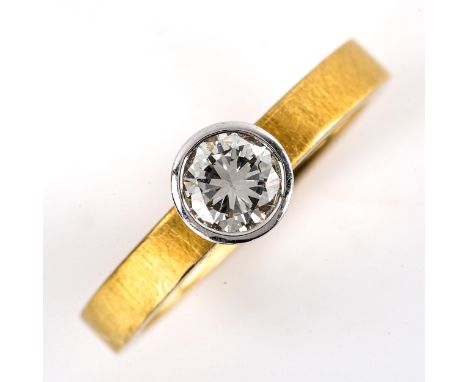 A modern 18ct gold 0.5ct solitaire diamond ring, bezel set with modern round brilliant-cut diamond, colour approx G/H, clarit