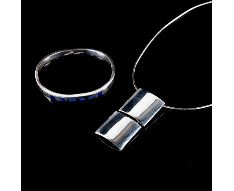 A Mexican sterling silver and blue enamel bracelet, and a modern stylised silver pendant necklace, 44.6g total (2)Enamel pane