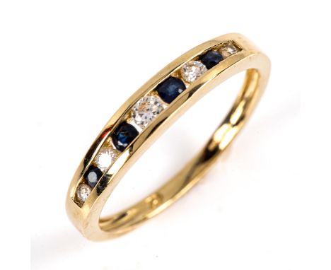 A modern 9ct gold sapphire and cubic zirconia quarter eternity ring, set with round-cut stones, setting height 3.6mm, size N,