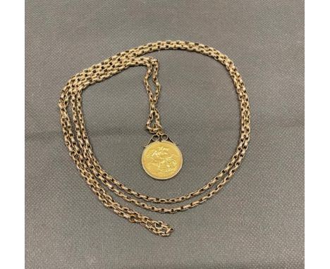 A 1889 full sovereign in 9 carat gold mount and chain, 29.6 grams, chain not hallmarked but tests gold