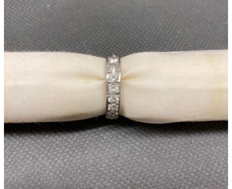 An 18 ct white gold ring set with 7 white stones 3.8 grams