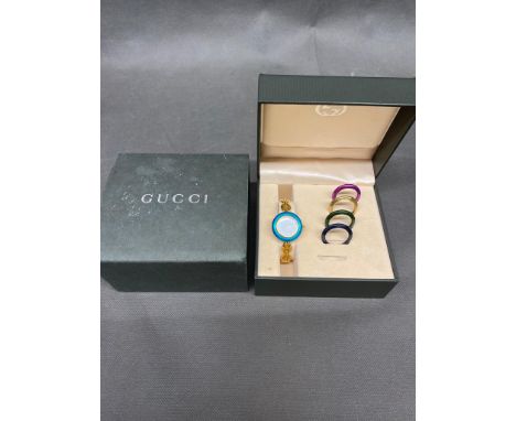 A boxed ladies Gucci watch