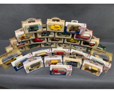 A collection of 30 boxed die cast model cars