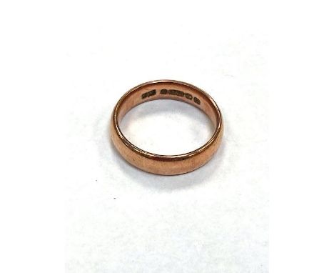 A 9ct gold band ring, size P.  CONDITION REPORT: 4.9g