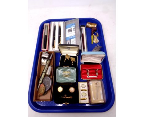 A tray of gent's cuff links, boxed pens including Parker, Swan &amp; Waterman, miniature pipe, whistle etc 