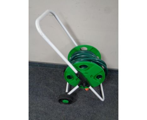 A hose pipe on reel and trolley 