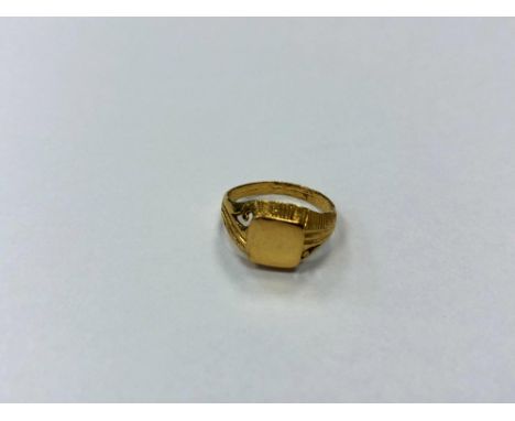 A child's gold ring stamped '22', size D.  CONDITION REPORT: 2g 