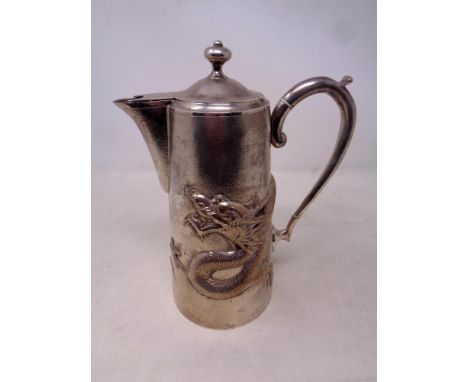 A Chinese silver coffee pot, embossed with dragon decoration, height 22.3 cm, stamped to base CONDITION REPORT: 566g