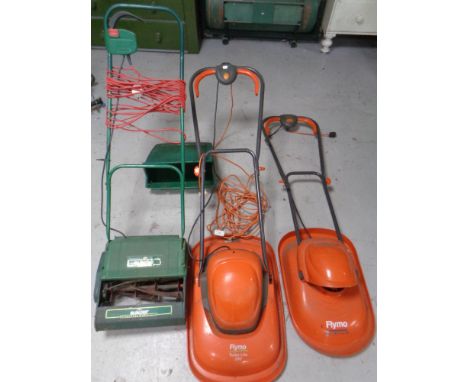 A Qualcast electric lawn mower with grass box together with two further Flymo mowers, micro light and turbo light 330 with le