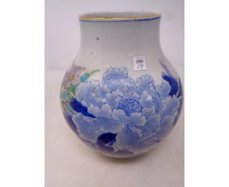 A Chinese glazed ceramic vase, decorated with flowers, height 19cm (as found)