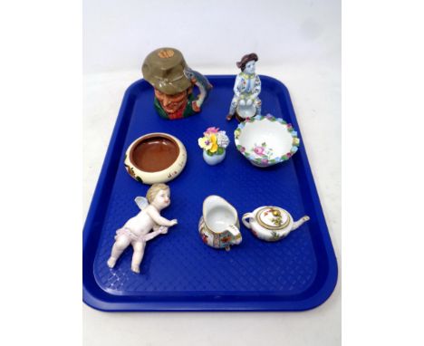 A tray of assorted ceramics - Royal Doulton poacher decanter, Torquay pottery dish, flower posy, cherub ornament, miniature H