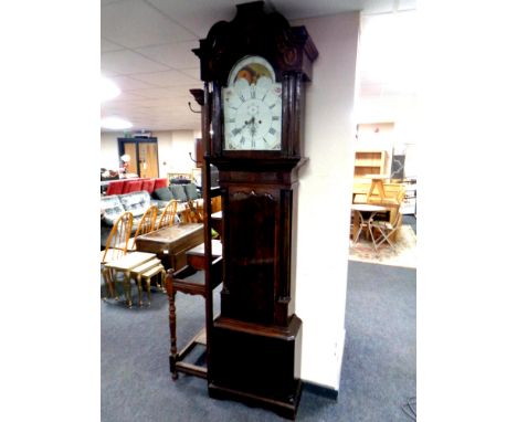 A George III mahogany eight day longcase clock with painted moon phase dial signed George Monks, Prescot