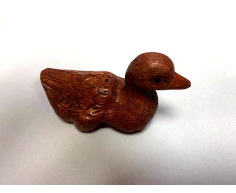 A Japanese carved fruitwood netsuke - Duck. 