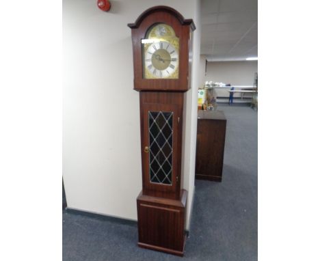 A Tempus Fugit longcase clock with pendulum and weights 