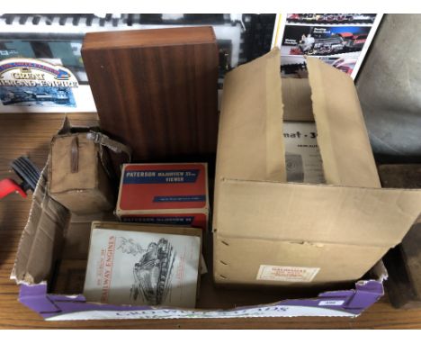 A box of Halinamat semi automatic projector, boxed, slide box, Brownie camera, Patterson viewer, Jerusalem wooden bound book,