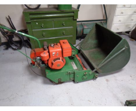 A vintage Hayter machine no. CA/3127 petrol lawn mower with roller and grass box 