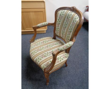 A French style carved beech salon chair in tapestry fabric 