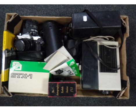 A box of photographic equipment - Fujica camera, lenses, projector, Kodak Junior number 1 in original box, pair of Swift bino