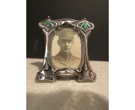 William Hutton & Sons Edwardian Art Nouveau silver and enamel photograph frame embossed with typical stylised flower stems, g