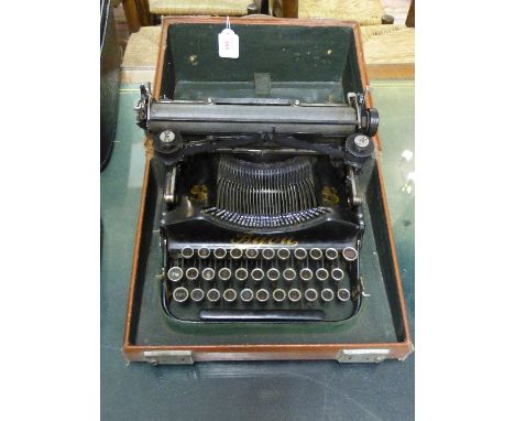 Bijou folding typewriter in fitted case with instruction book no 3017