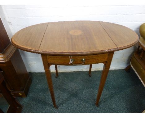 An Edwardian light mahogany oval lap side table with single drawer, the top with central medallion inlay, on square tapering 