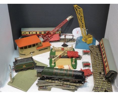 Hornby Dublo model railway items to include: signal box, two carriages, Duchess of Montrose engine, crane No 133, level cross