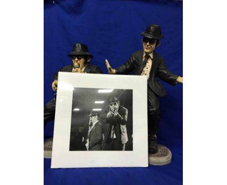 TWO RESIN FIGURES MODELLED AS THE BLUES BROTHERStogether with a photographic print of the Blues Brothers (3) 