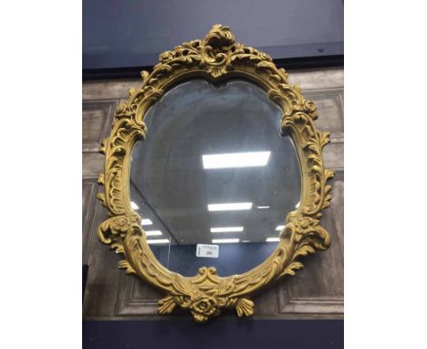 CERAMIC OVAL GILT PAINTED WALL MIRROR