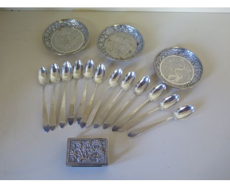 Three Chinese silver coasters, six Chinese silver tea spoons and a Chinese silver match case - seal marks to all except match