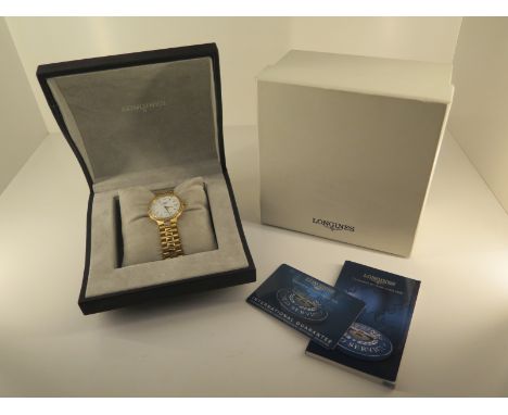 An 18ct yellow gold and diamond Longines Conquest Quartz gents bracelet watch with white dial and calendar - Width 35mm inclu