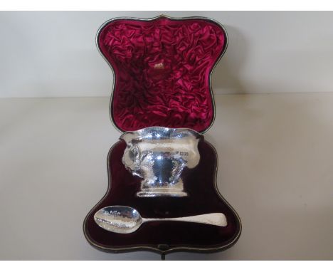 A good silver dish and spoon with hammered finish London 1900/01 G & S Co Ld - bowl 8cm tall P.A.S.H. 1899 - total weight app