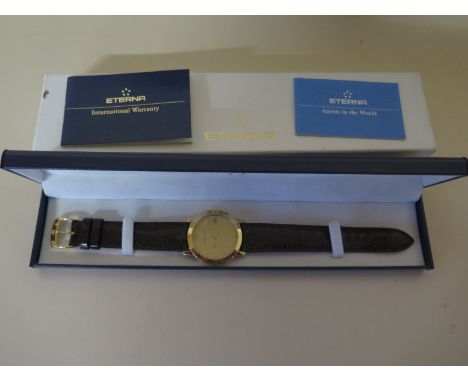 A gentleman's Eterna-Matic automatic wristwatch, champagne coloured dial with baton markers, date aperture at 3 o'clock, cent