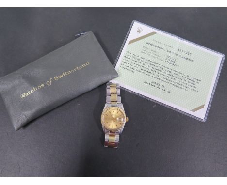 A Gents Rolex Bi Metal Oyster Perpetual Datejust wristwatch with champagne dial, with service guarantee model 1601/3, serial 