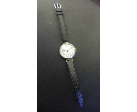 A Vintage Gents Trench Watch, Manual Wind, 37mm wide, including button, working in saleroom, some wear to dial