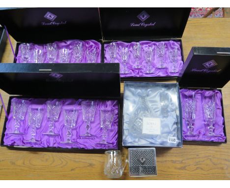 A collection of Edinburgh glassware including 3 sets of 6, a jug and two champagne flutes, 27 pieces and an M&S Loire decante