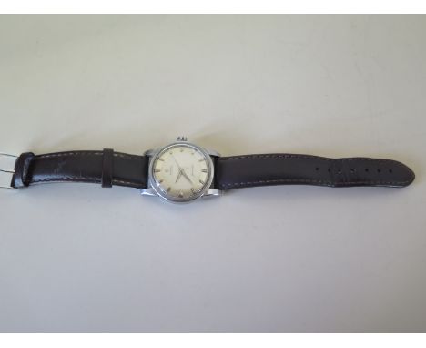 A gentleman's Omega automatic Seamaster silvered chapter ring with baton markers on white dial, center sweep seconds in stain