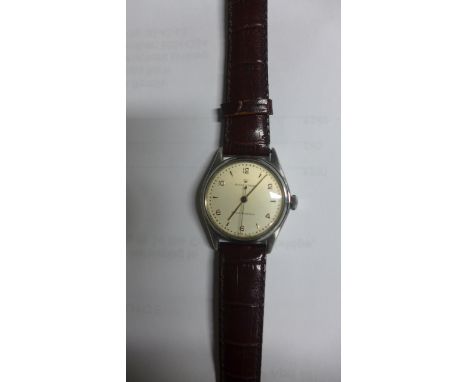 A vintage Rolex Oyster shock absorbing gentleman's manual wind wristwatch on a faux crocodile strap in refurbished, working o