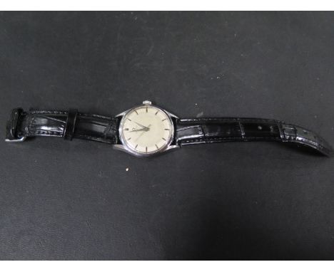 A Vintage Gents Stainless Steel Omega Manual Wind Wristwatch, 37mm wide, including button, working in saleroom, clean conditi
