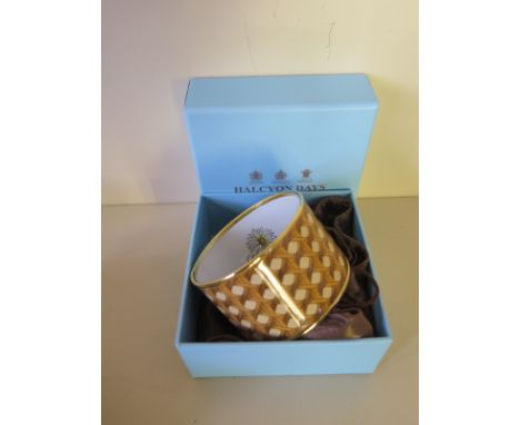 A Halcyon Days bangle, 4cm deep with box and bag 
