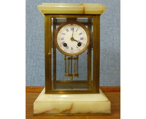 A 19th Century French onyx and glass four sided clock 
