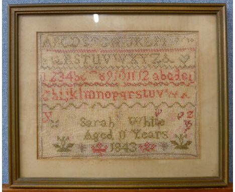 A small Victorian sampler by Sarah White, aged 11 years, 1843, framed